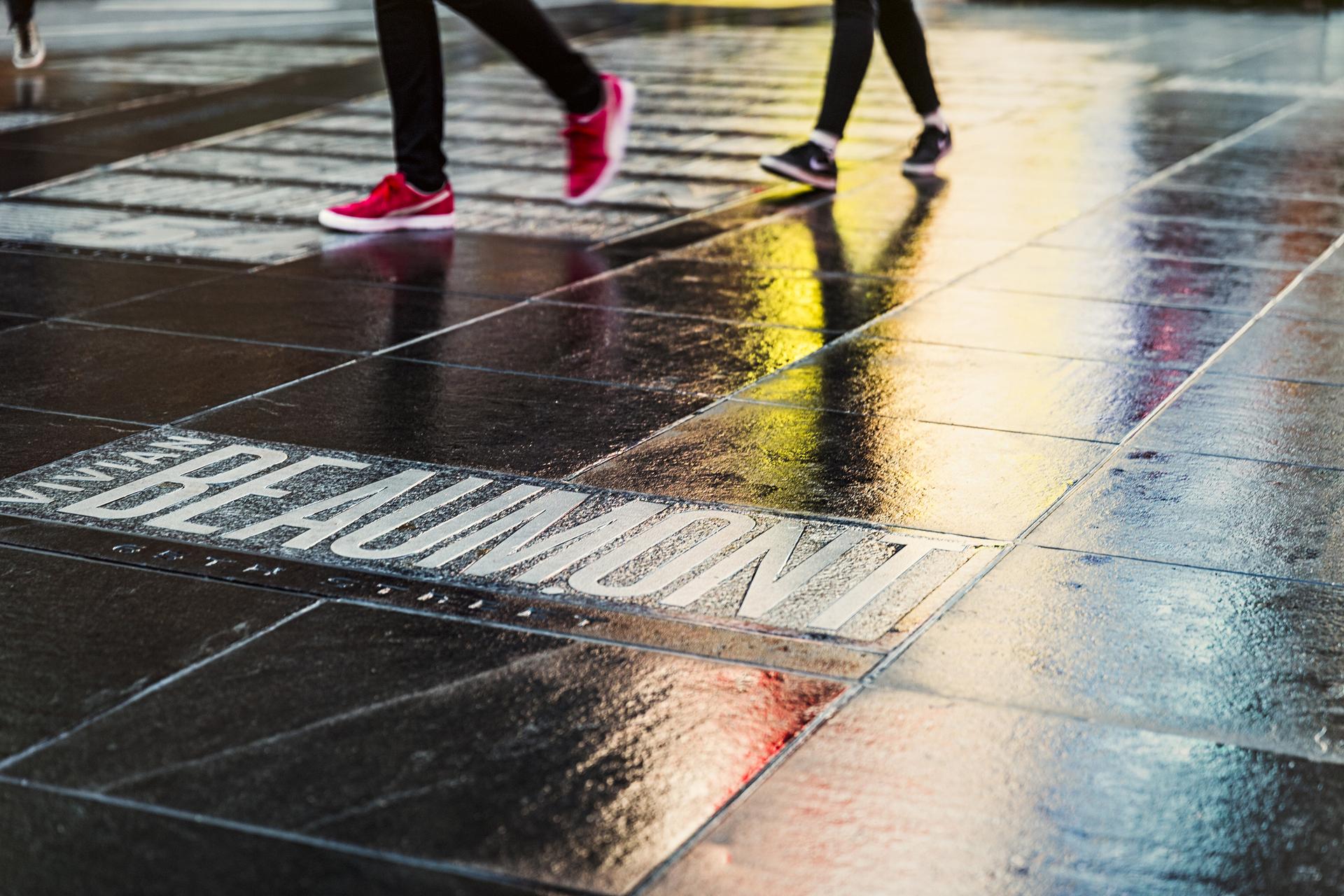 Peoples feet at Times Square in NYC