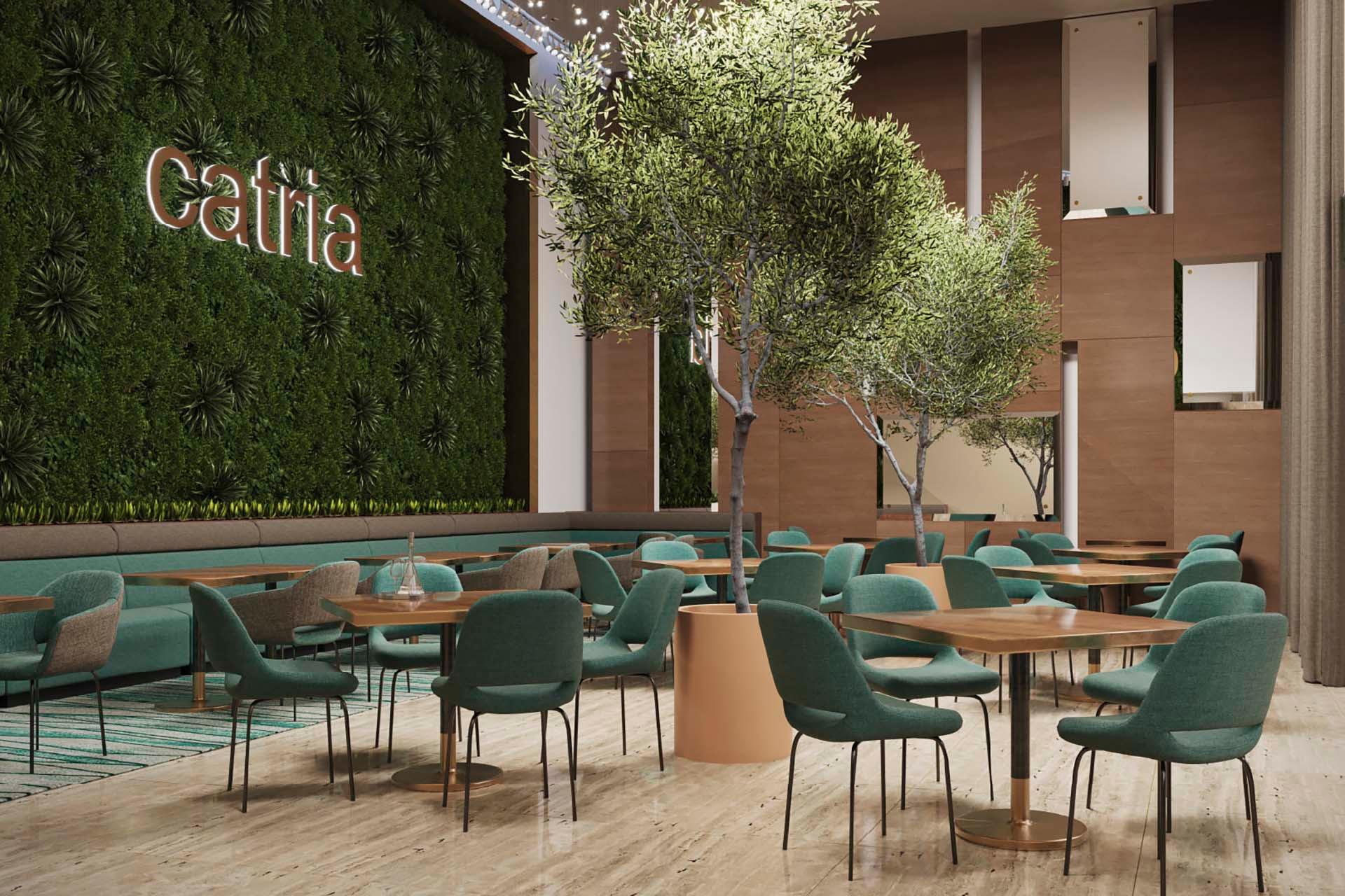 Modern cafe interior featuring a green wall with the sign "cafita," teal upholstered chairs, and wooden tables. Potted trees add a natural touch to the open, airy space with light marble flooring and neutral curtains.