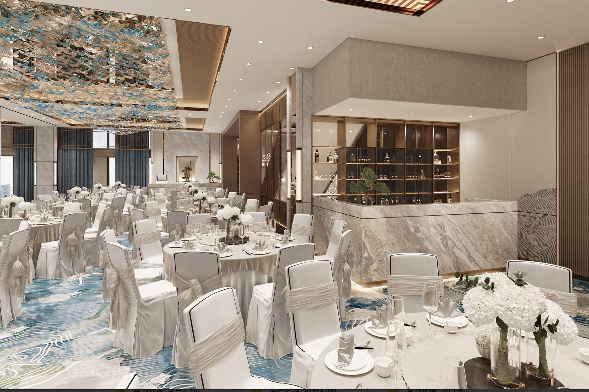 Elegant banquet hall with round tables covered in white cloths, white chairs with bows, floral centerpieces, and a marble bar area; modern decor with blue-patterned carpet and unique ceiling art.